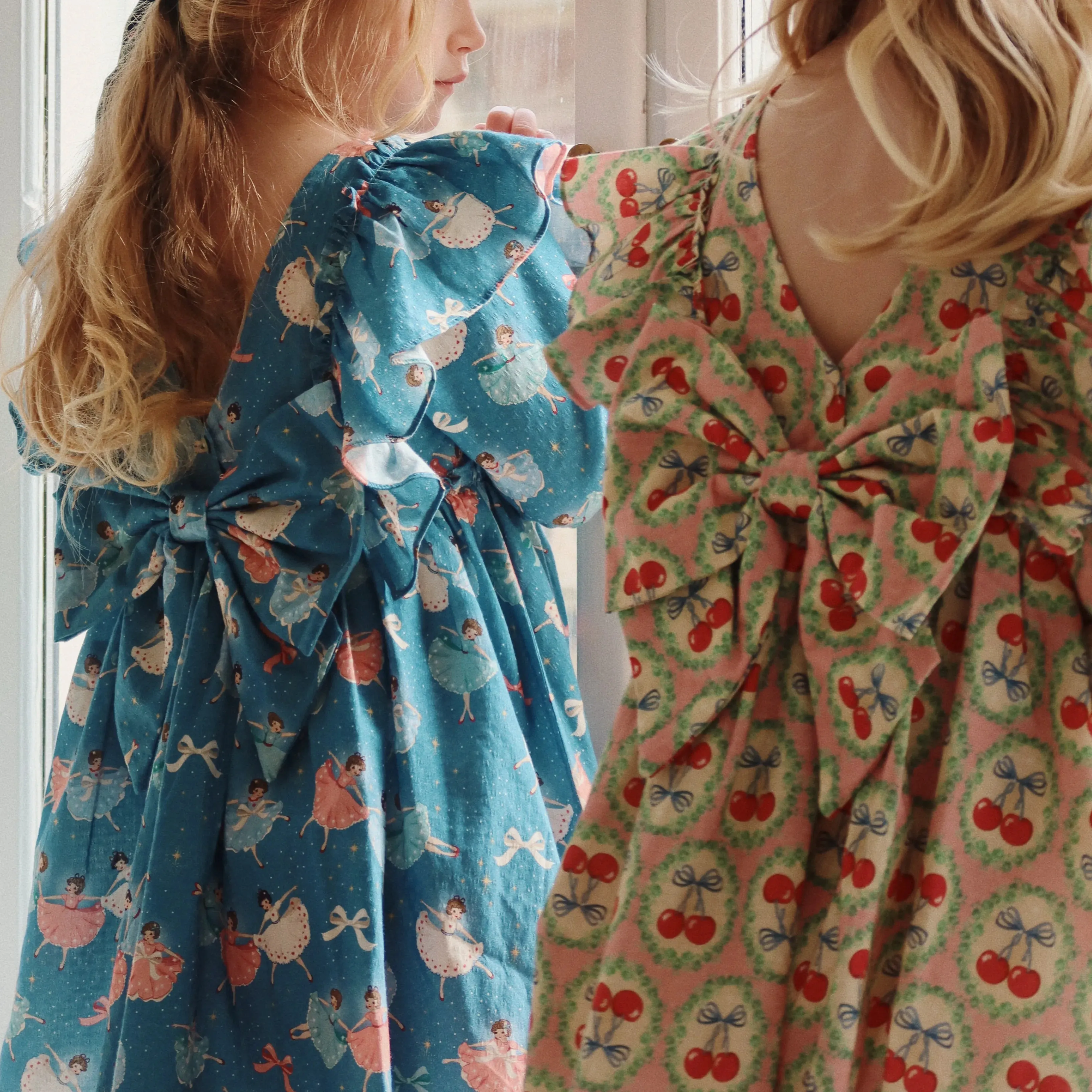 Evia Bow Ballerina Print Long Sleeve Ruffle Dress