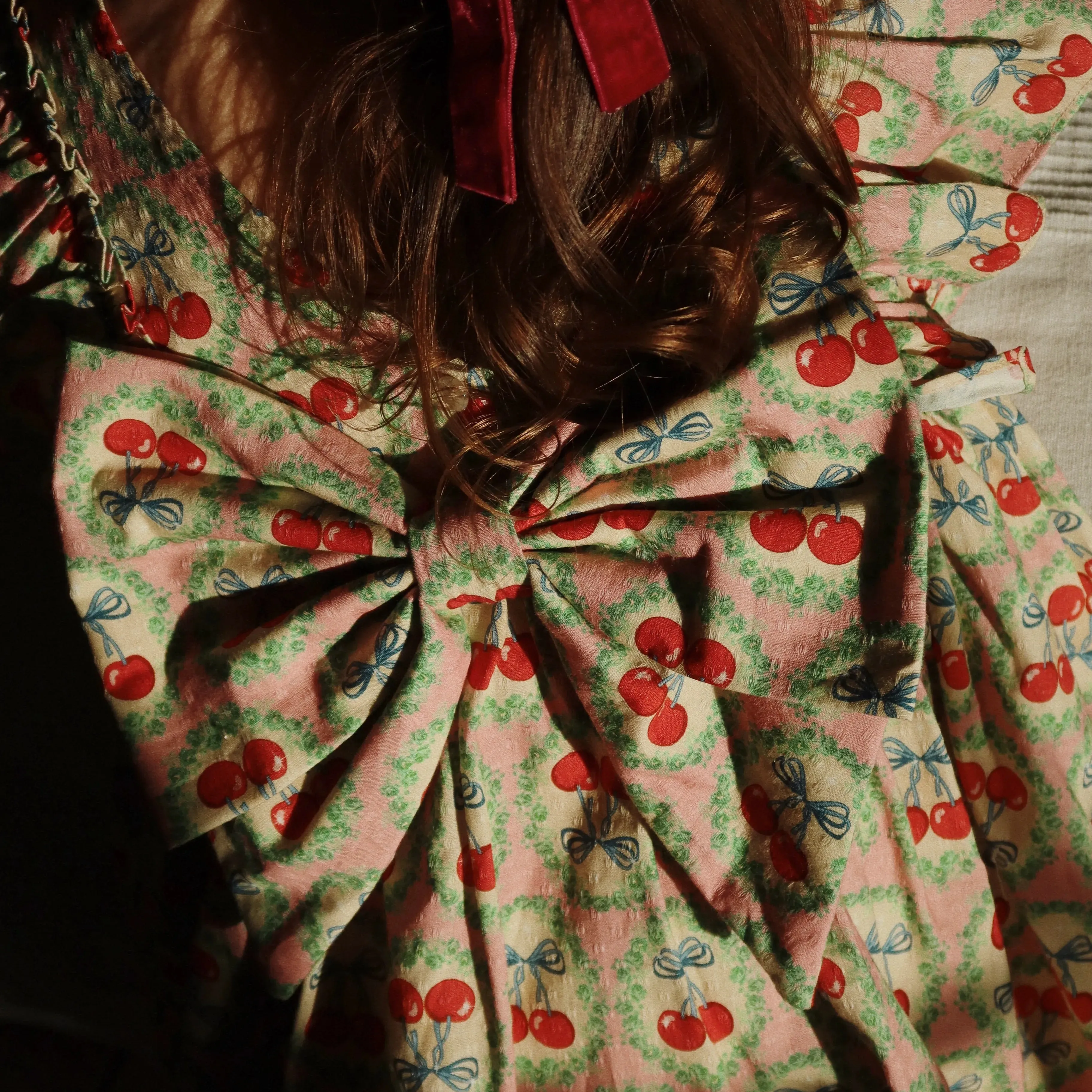 Evia Cherry Bow Print Long Sleeve Ruffle Dress